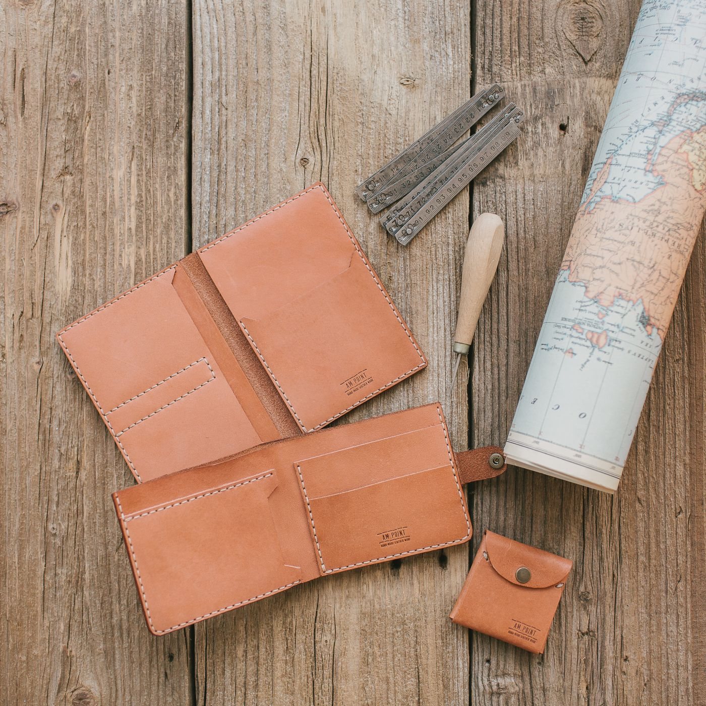 A handmade brown leather wallet and card holder