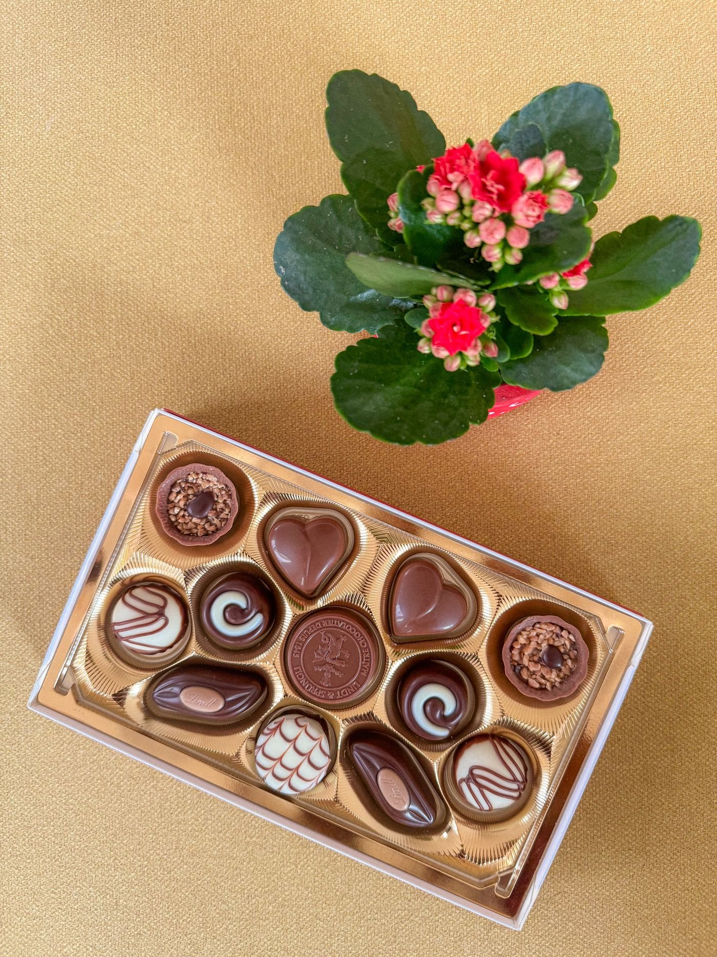 A box of chocolates with flowers