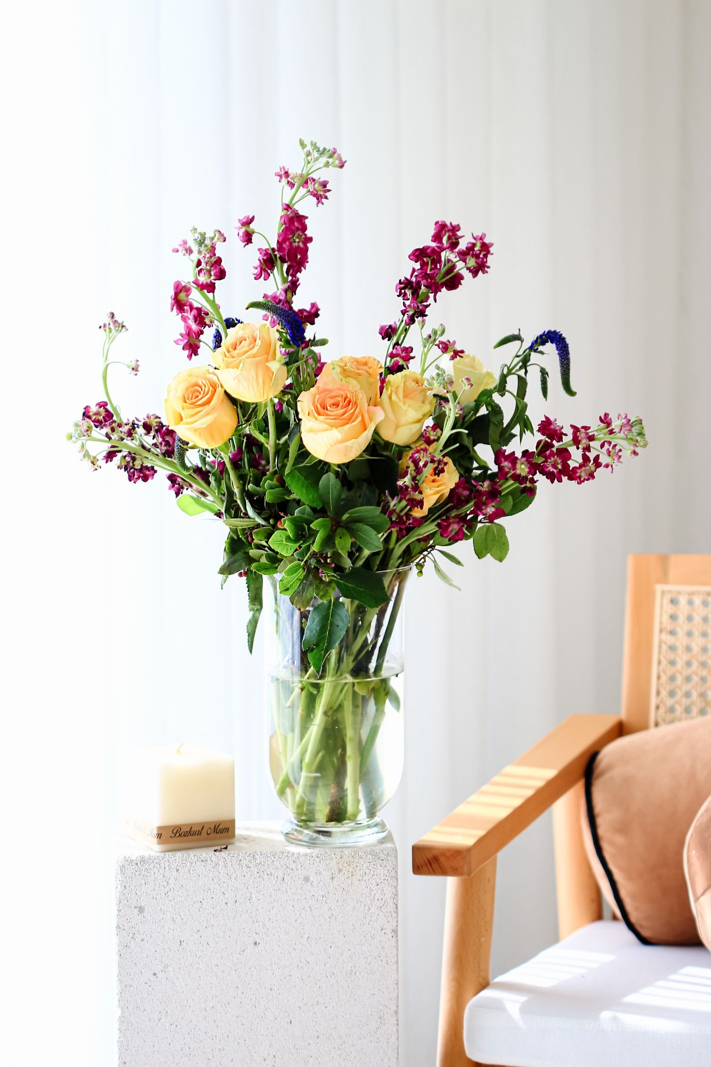 A bouquet in a vase in a sunny room