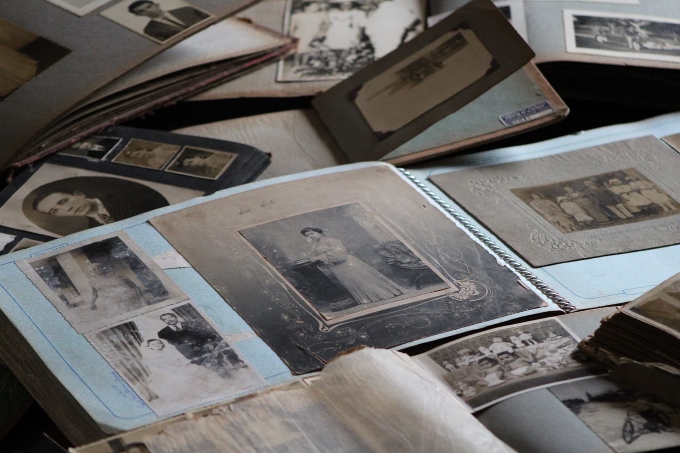 An open album filled with old family photographs