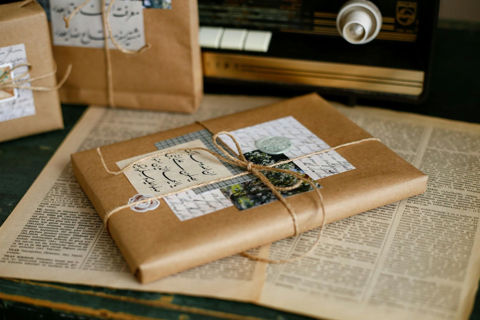 Kraft-paper gifts presented on printed book pages